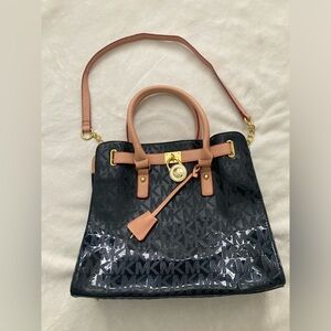 Michael Kors black and tan hand bag